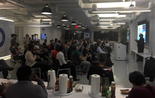 GridGain technology evangelist Akmal Chaudhri speaking at a meetup in New York City.